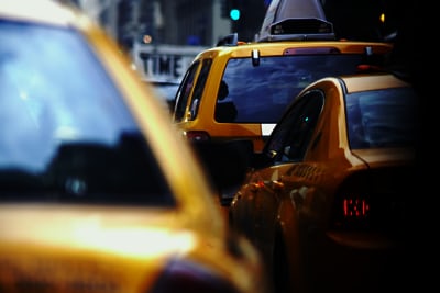 Yellow Taxi Cab in a city